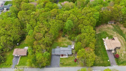 210 Willow Dr, Jefferson Twp, PA 18436 - drone / aerial view of a heavily wooded area