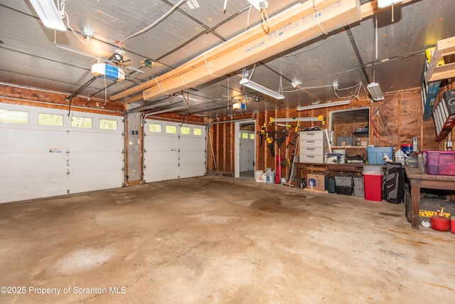 210 Willow Dr, Jefferson Twp, PA 18436 - garage featuring a garage door opener