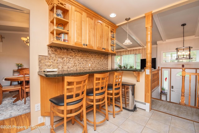 210 Willow Dr, Jefferson Twp, PA 18436 - kitchen with open shelves, a chandelier, backsplash, a kitchen breakfast bar, and pendant lighting