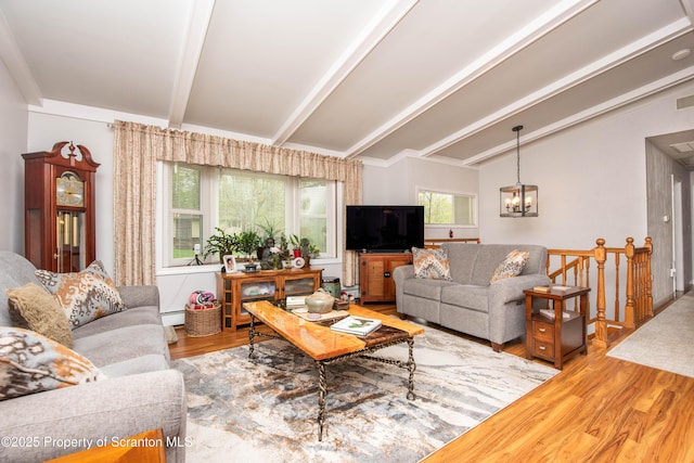 210 Willow Dr, Jefferson Twp, PA 18436 - living area featuring wood finished floors and a chandelier