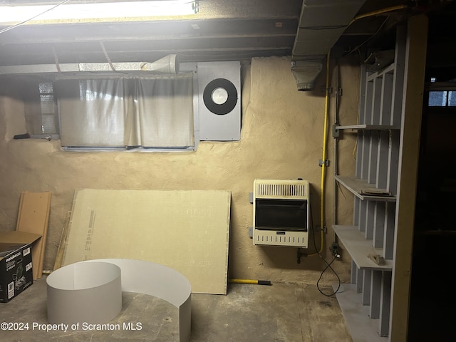 basement featuring heating unit