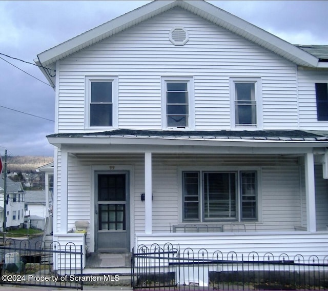 99 Green St, Edwardsville, PA 18704 - view of front facade with a porch