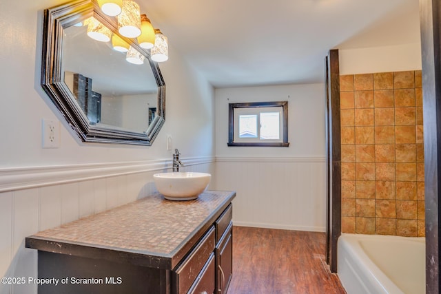 506 Short St, Throop, PA 18512 - bathroom with wood finished floors, vanity, and a wainscoted wall