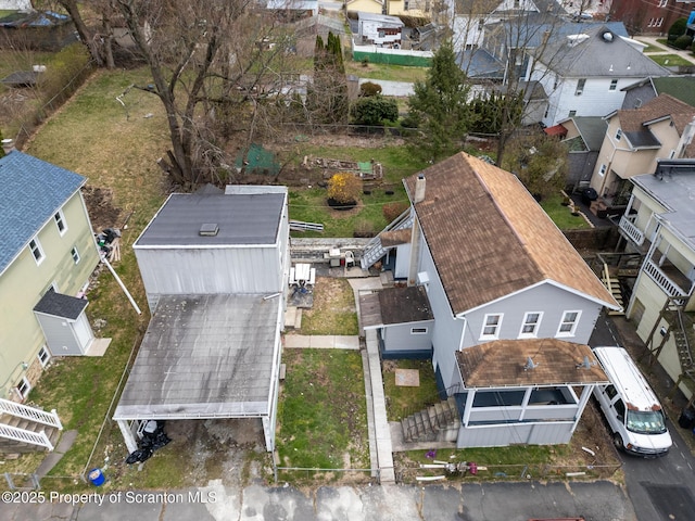 drone / aerial view with a residential view