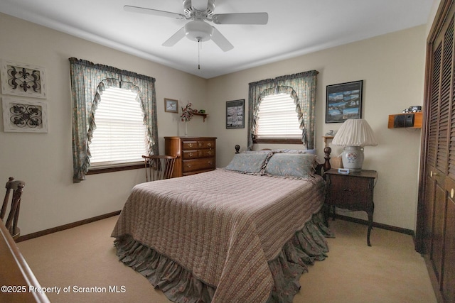 1 Walnutwood Dr, Laflin, PA 18702 - bedroom with light carpet, multiple windows, baseboards, and ceiling fan