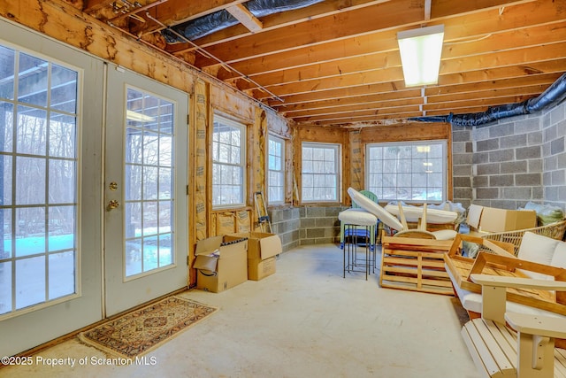 interior space with french doors and a healthy amount of sunlight