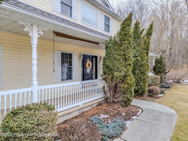 entrance to property with a porch