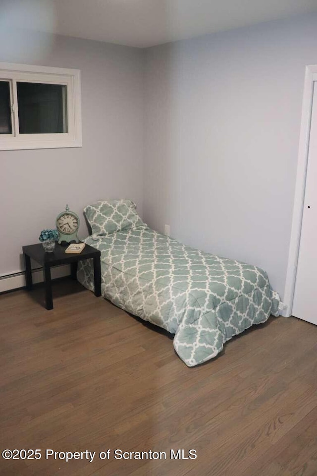 bedroom featuring hardwood / wood-style flooring