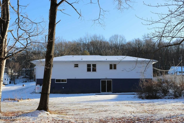 view of snow covered property