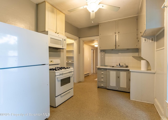 989 Main St, New Milford, PA 18834 - kitchen with white appliances, a ceiling fan, a baseboard radiator, tasteful backsplash, and light countertops