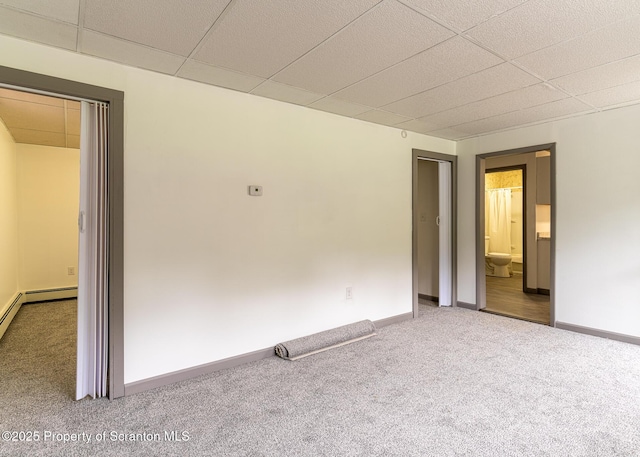 989 Main St, New Milford, PA 18834 - unfurnished room with carpet floors and a paneled ceiling