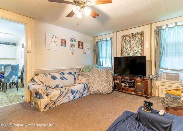 989 Main St, New Milford, PA 18834 - living area featuring carpet, ceiling fan, and cooling unit