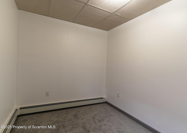 989 Main St, New Milford, PA 18834 - carpeted empty room with baseboard heating and a paneled ceiling