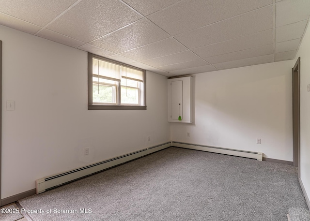 989 Main St, New Milford, PA 18834 - carpeted spare room with a paneled ceiling and a baseboard heating unit
