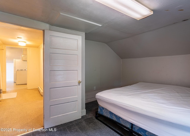 989 Main St, New Milford, PA 18834 - bedroom with tile patterned floors, lofted ceiling, and freestanding refrigerator