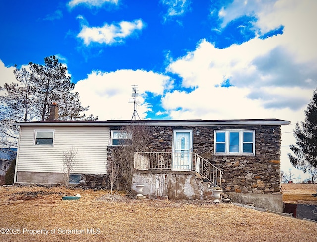 view of front of property with stone siding