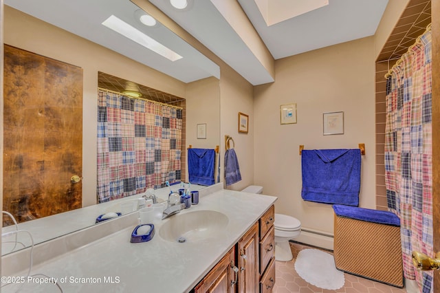 full bath featuring vanity, a shower with shower curtain, a baseboard heating unit, tile patterned floors, and toilet