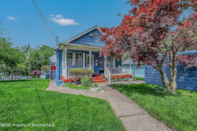 2230 Birney Ave, Scranton, PA 18505 - view of front of property with a porch and a front lawn