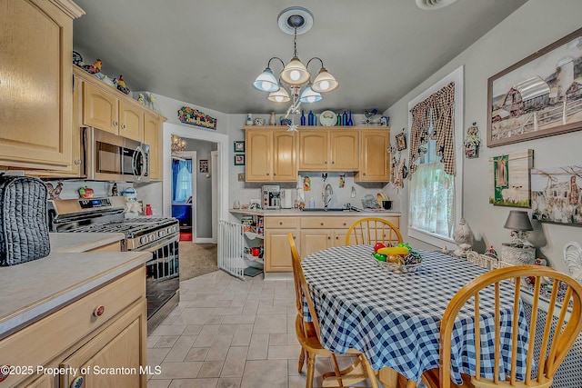 2230 Birney Ave, Scranton, PA 18505 - kitchen featuring appliances with stainless steel finishes, a sink, light brown cabinets, and light countertops