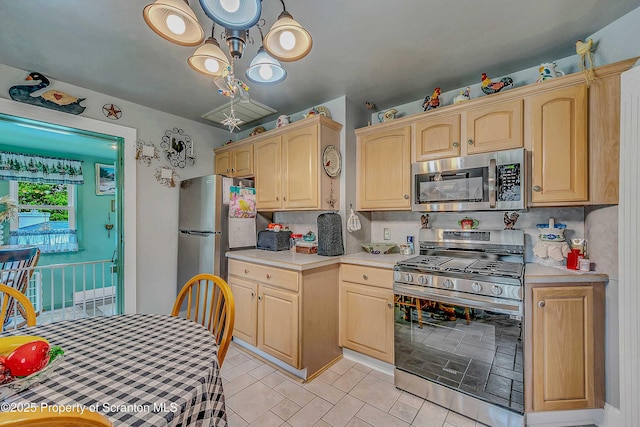 2230 Birney Ave, Scranton, PA 18505 - kitchen featuring stainless steel appliances, light countertops, and light brown cabinetry