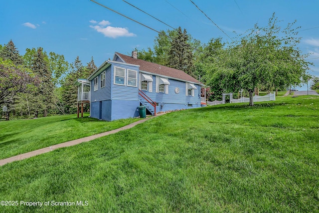2230 Birney Ave, Scranton, PA 18505 - view of home's exterior with a chimney and a yard