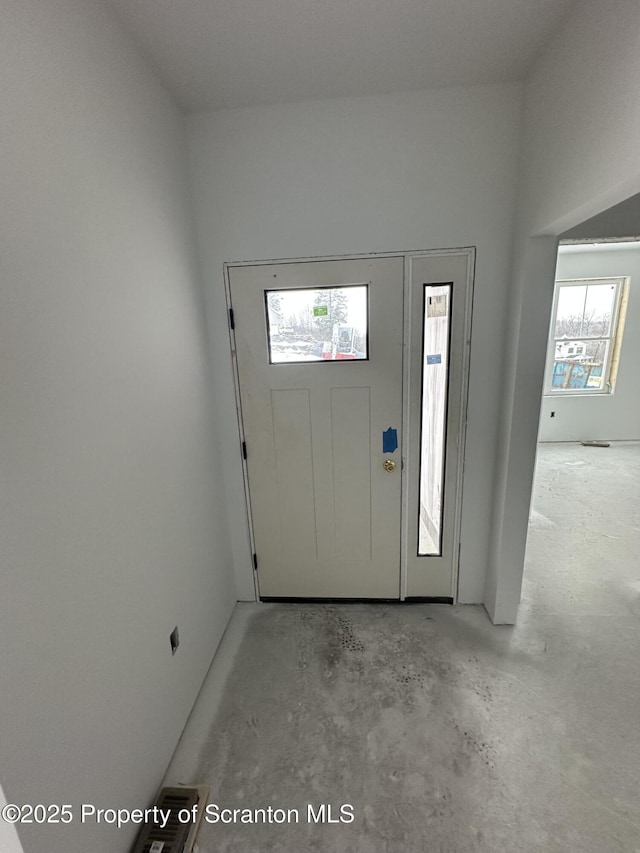 entryway featuring concrete floors