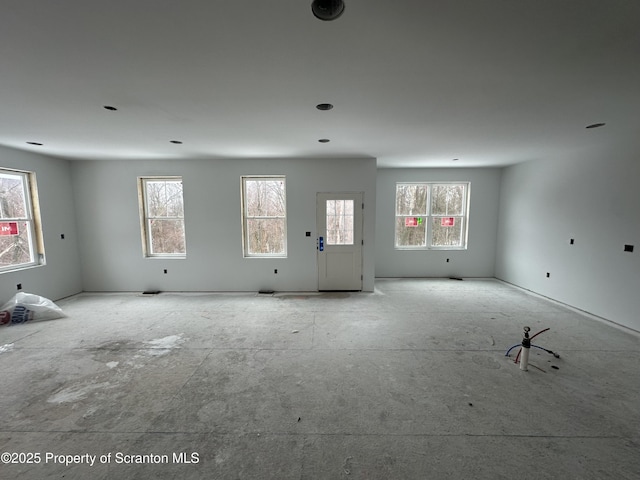 spare room with plenty of natural light