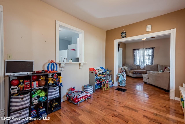 game room featuring wood finished floors