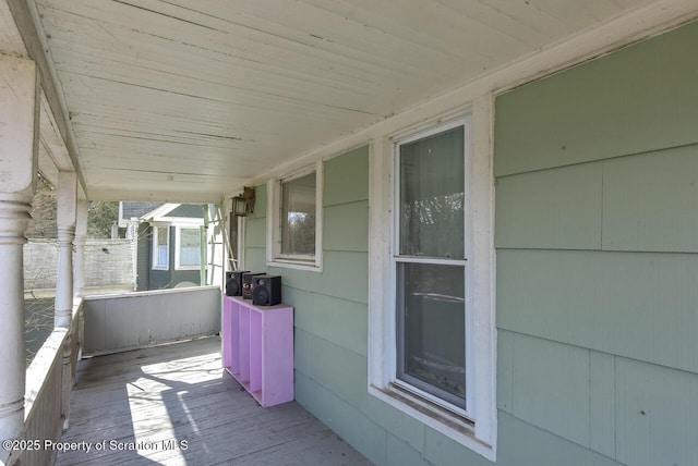 deck with covered porch