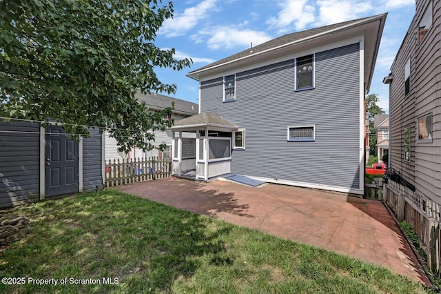 908 Prescott Ave, Scranton, PA 18510 - rear view of property featuring a patio
