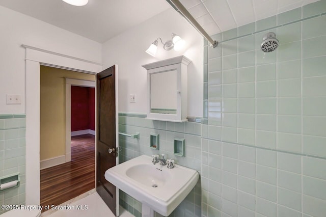 908 Prescott Ave, Scranton, PA 18510 - bathroom featuring tile walls, wood finished floors, and a wainscoted wall
