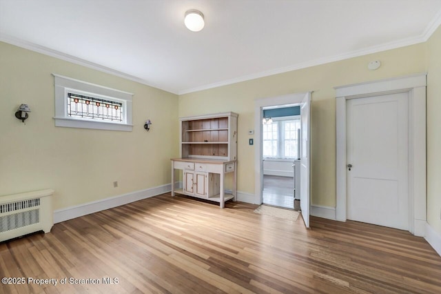 908 Prescott Ave, Scranton, PA 18510 - unfurnished bedroom featuring crown molding and wood finished floors