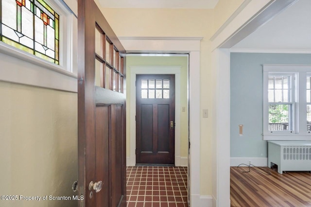 908 Prescott Ave, Scranton, PA 18510 - entrance foyer with radiator and crown molding