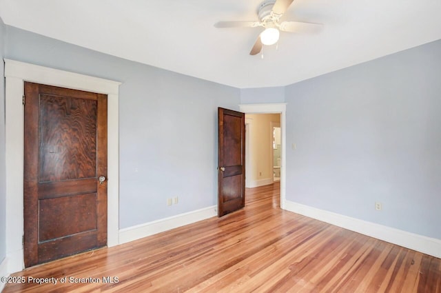 908 Prescott Ave, Scranton, PA 18510 - unfurnished bedroom with light wood-type flooring and ceiling fan