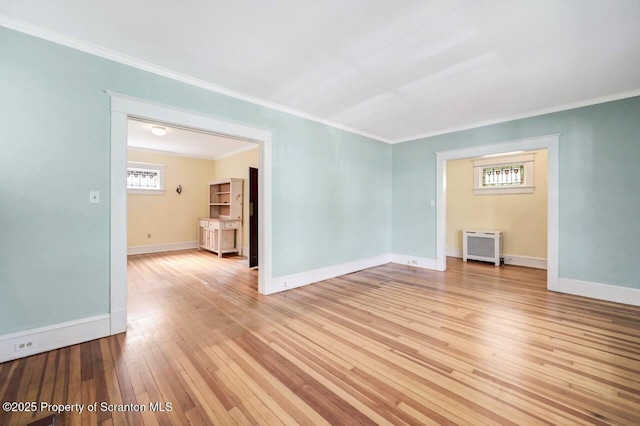 908 Prescott Ave, Scranton, PA 18510 - spare room featuring light wood-style flooring and crown molding