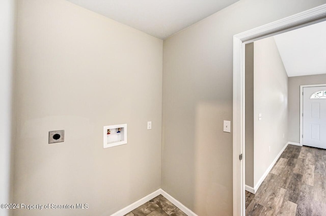 laundry area with hookup for a washing machine, laundry area, hookup for an electric dryer, and baseboards