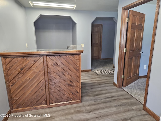 464 Main St, New Milford, PA 18834 - hallway featuring wood finished floors and arched walkways