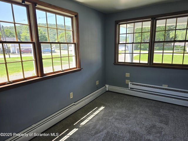 464 Main St, New Milford, PA 18834 - unfurnished room featuring a baseboard radiator, plenty of natural light, and dark carpet