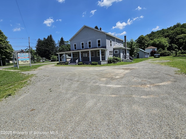 464 Main St, New Milford, PA 18834 - view of front of property with dirt driveway and a porch
