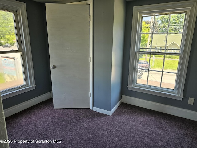 464 Main St, New Milford, PA 18834 - unfurnished bedroom with dark colored carpet