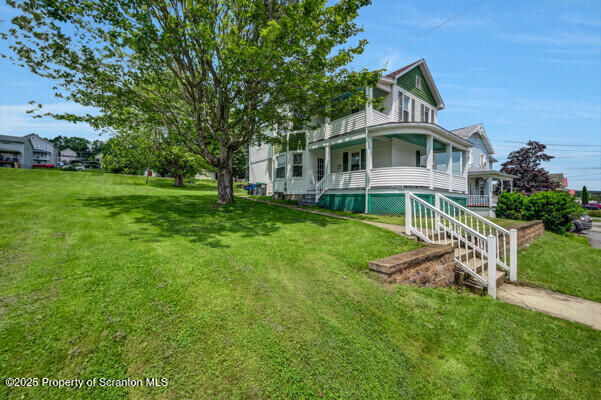 523 Hudson St, Forest City, PA 18421 - view of front of house with a front yard