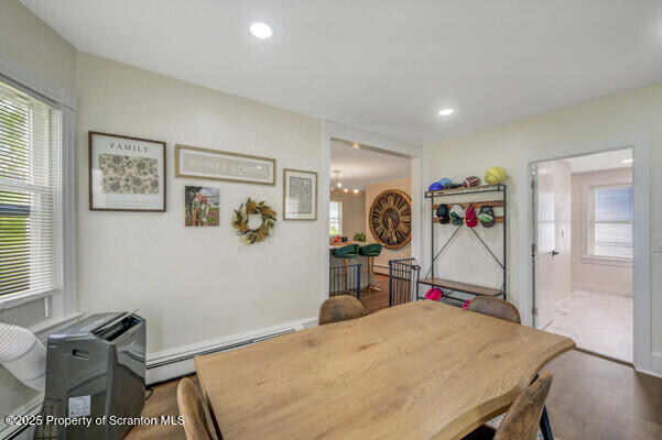 523 Hudson St, Forest City, PA 18421 - dining space featuring a baseboard radiator, wood finished floors, and recessed lighting