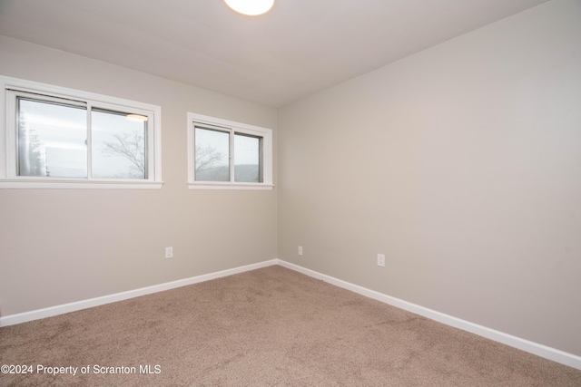 view of carpeted spare room