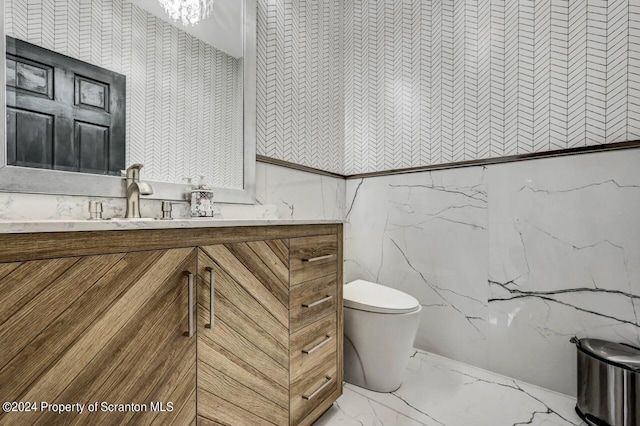 bathroom with vanity and toilet