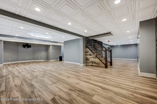 basement with light wood-type flooring