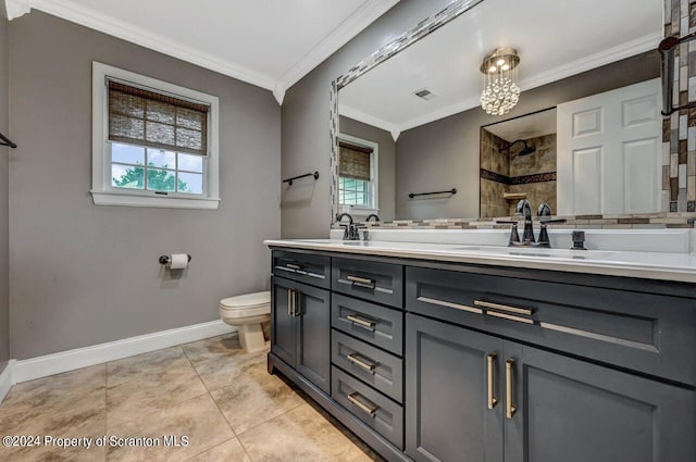 bathroom featuring tile patterned floors, walk in shower, vanity, crown molding, and toilet