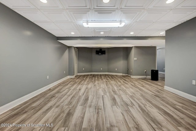 basement with light wood-type flooring