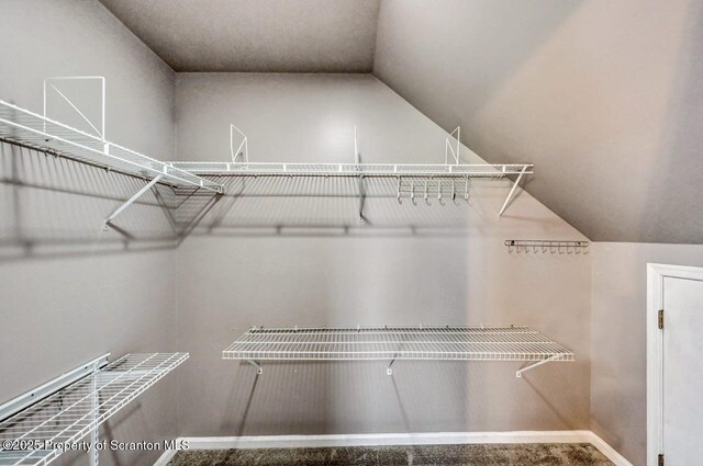 kitchen with backsplash, a kitchen island with sink, ventilation hood, oven, and sink