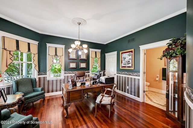 office space with hardwood / wood-style flooring, a notable chandelier, and crown molding