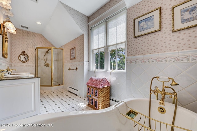 bathroom with tile patterned flooring, vanity, a shower with shower door, and a baseboard heating unit